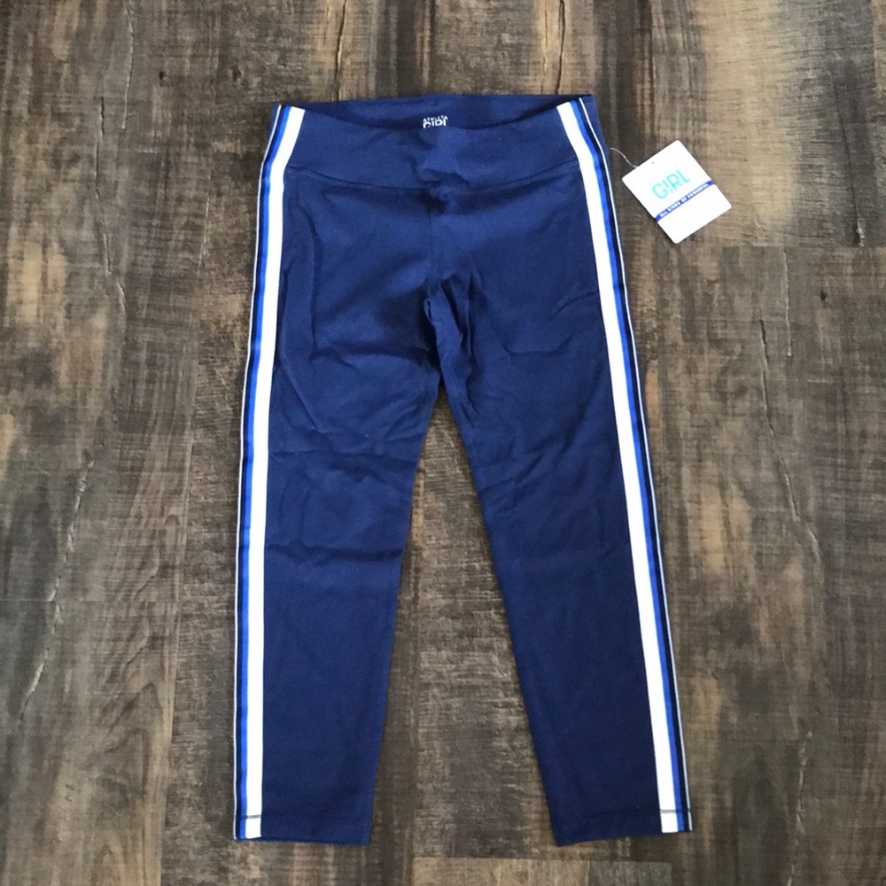 Navy Athleta cropped leggings with stripe on side